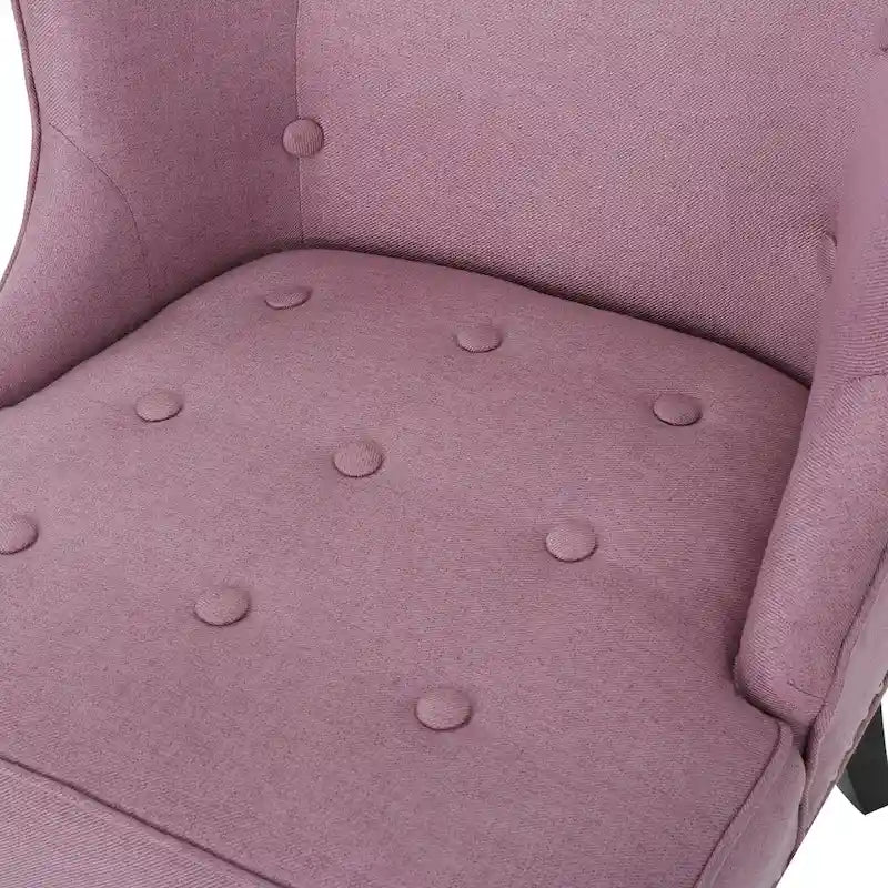 Poltrona d’accento contemporanea color viola lavanda con trapuntatura a cialda e bordatura con borchie