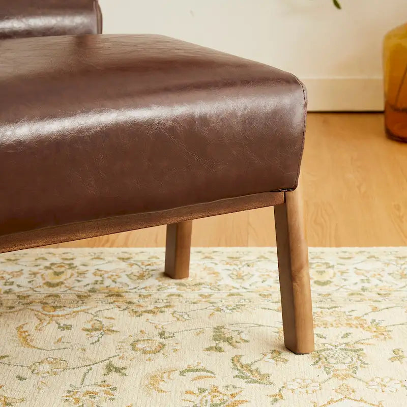 Mid-Century-Akzenthocker aus Kunstleder mit ausgestellten Beinen aus Gummibaumholz