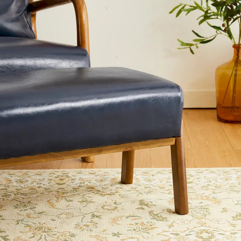 Mid-Century-Akzenthocker aus Kunstleder mit ausgestellten Beinen aus Gummibaumholz